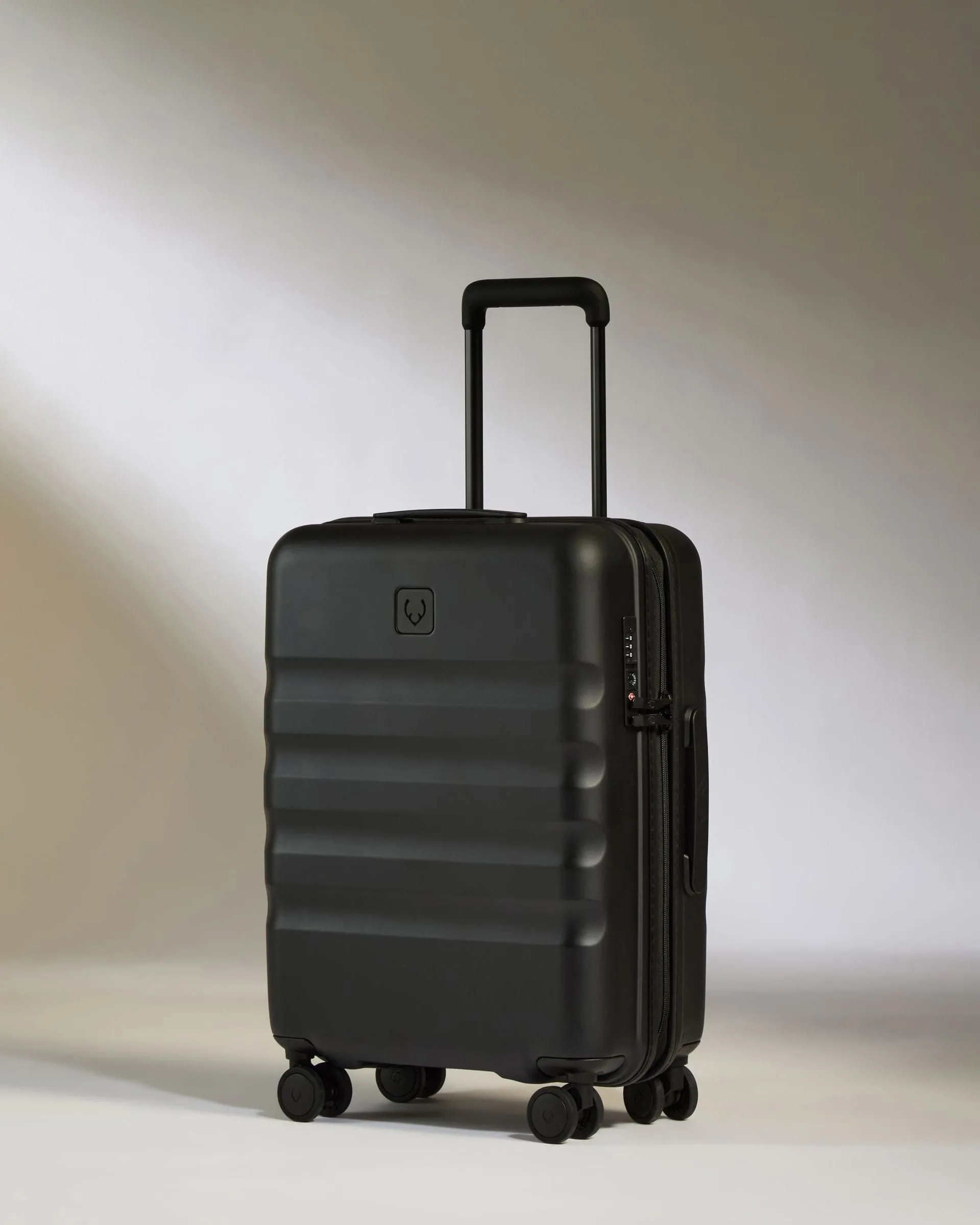 Cabin Suitcase In Black - Icon Stripe Save More Now Biggest Savings Now