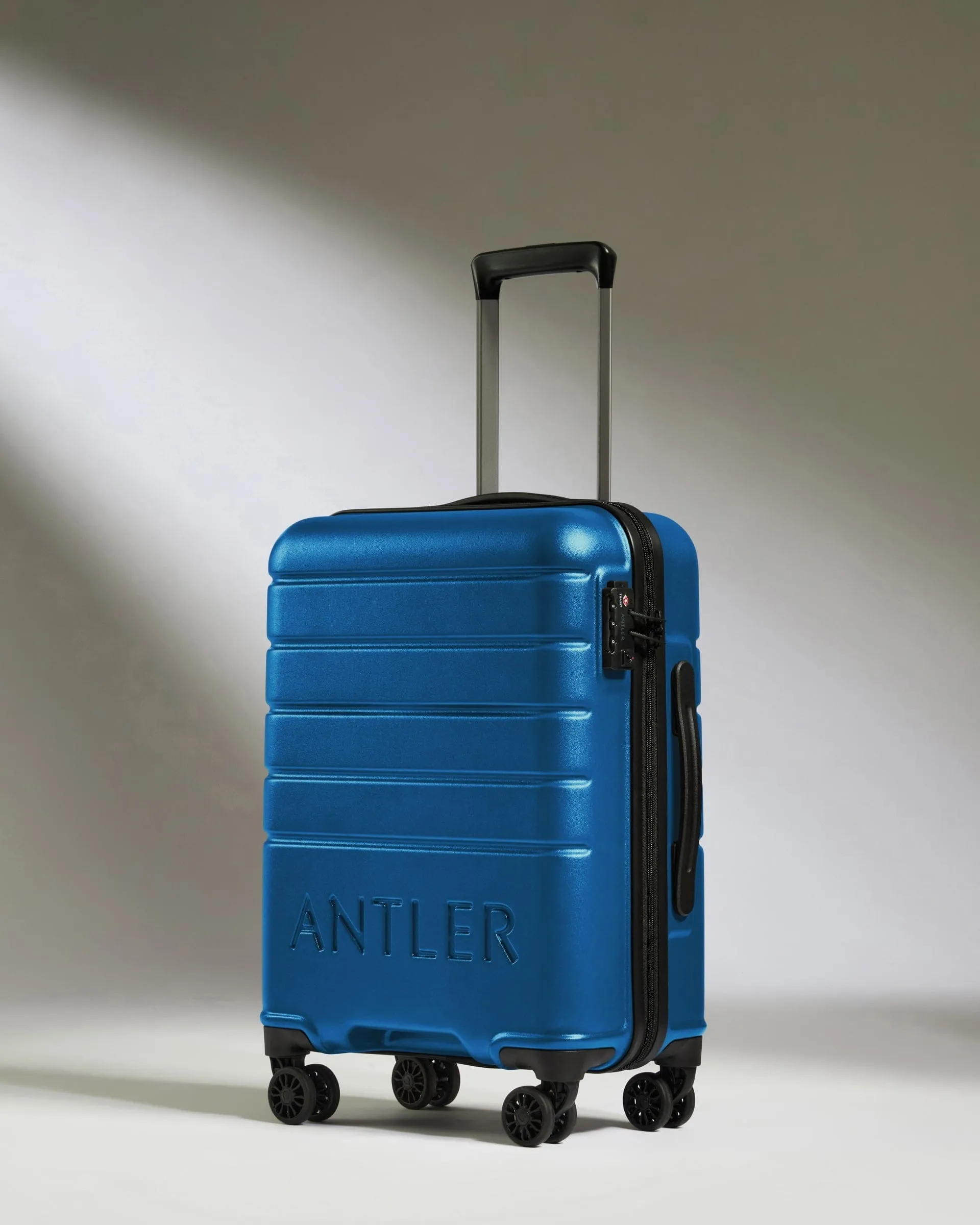 Hot Pick of the Day Cabin Suitcase In Bold Blue - Logo
