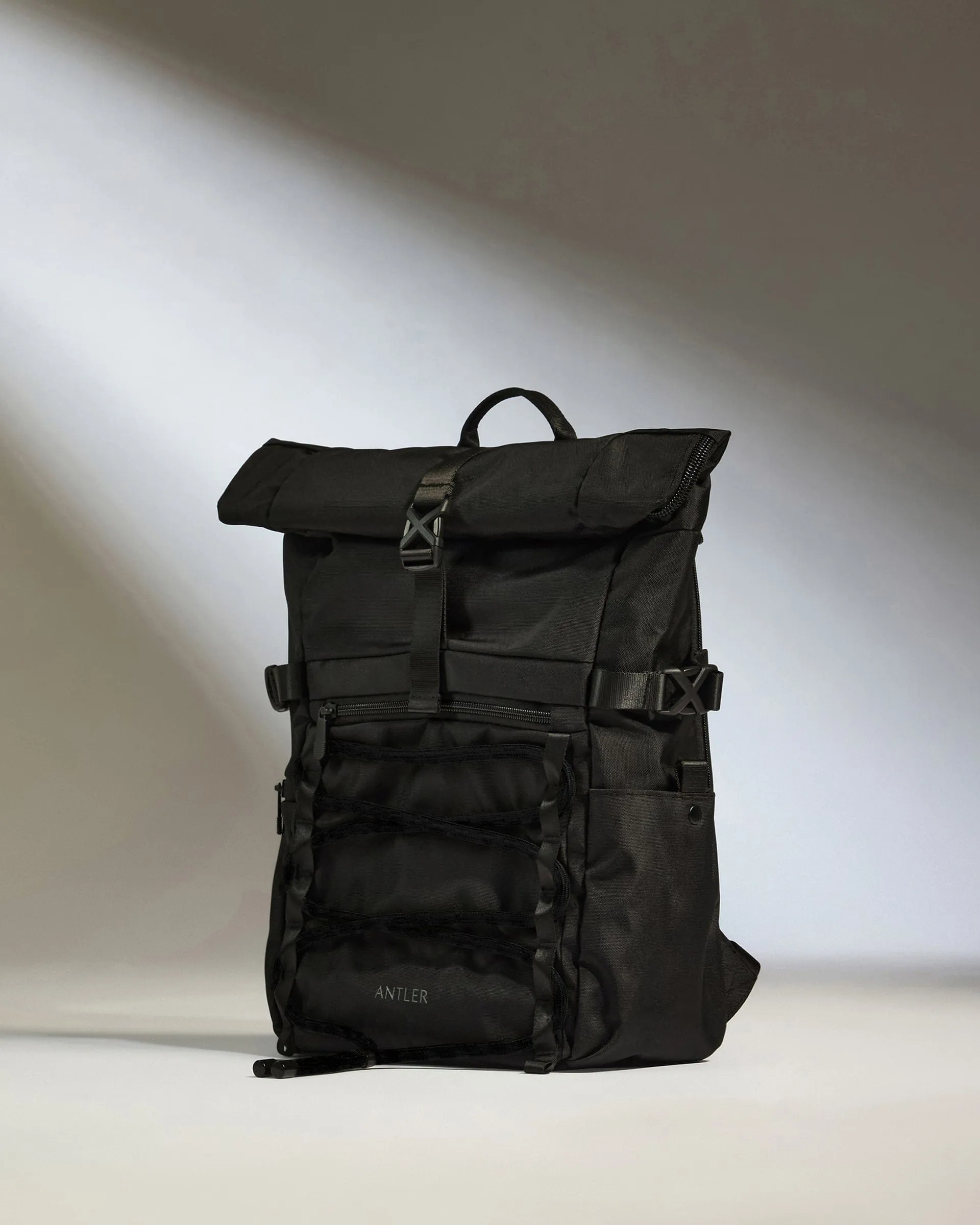 Discovery Roll Top Backpack In Black Trendy Picks Today
